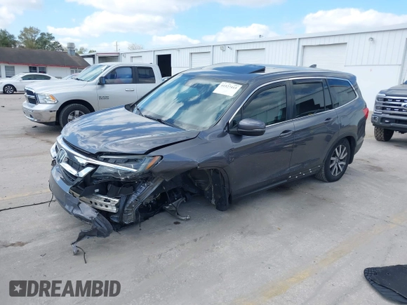 2020 Honda Pilot EX-L with VIN 5FNYF5H59LB014497, listed as a IAAI auction lot 41527415 with 66,625 mi miles. Bid and sale history available at carsss.com. Image 2.