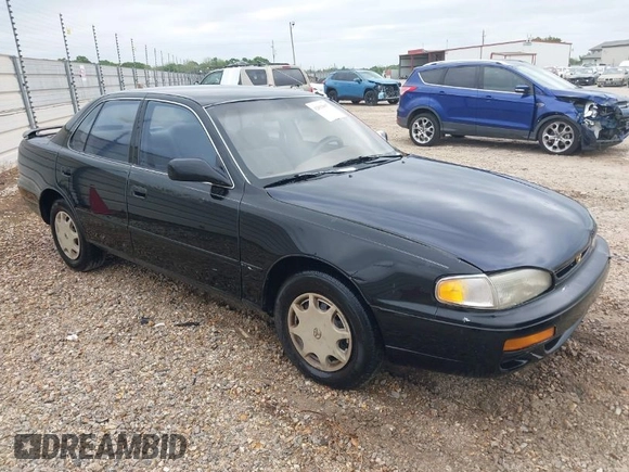 1996 Toyota Camry DX with VIN 4T1BG12K6TU754392, listed as a IAAI auction lot 42013697 with 172,410 mi miles. Bid and sale history available at carsss.com. Image 1.