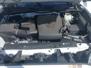 2019 Toyota Tacoma SR z VIN 3TMCZ5AN5KM249582, wystawiony jako IAAI lot #41925752 z przebiegiem 108 417 mil mil oraz . Historia ofert i sprzedaży dostępna na DreamBid. Obrazek 10.