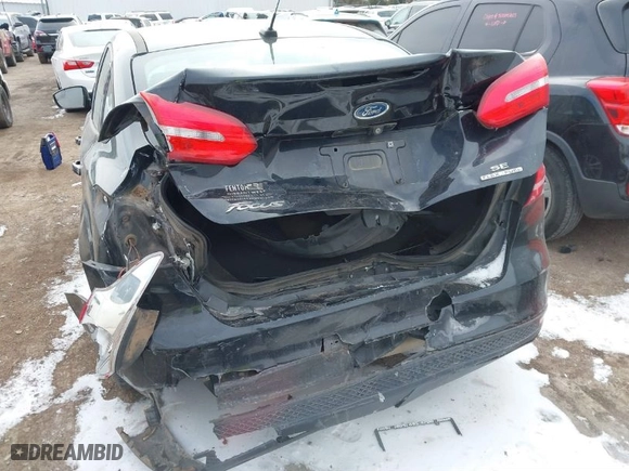 2016 Ford Focus SE with VIN 1FADP3F21GL235559, listed as a IAAI auction lot 41624268 with 136,330 mi miles. Bid and sale history available at carsss.com. Image 6.