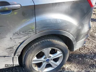 2015 Ford Escape SE with VIN 1FMCU9GX6FUB35649, listed as a IAAI auction lot 42055398 with 128,524 mi miles. Bid and sale history available at carsss.com. Image 16.