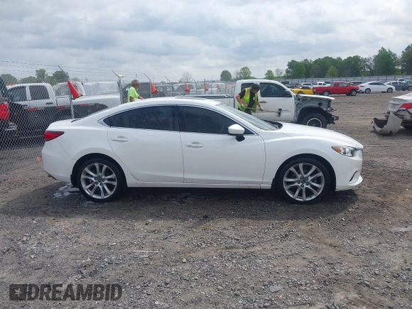 2016 Mazda Mazda6 i Touring with VIN JM1GJ1V56G1448334, listed as a IAAI auction lot 42075222 with 52,883 mi miles. Bid and sale history available at carsss.com. Image 13.
