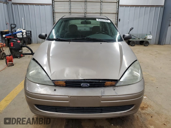 2003 Ford Focus LX with VIN 1FAFP33P63W257719, listed as a Copart auction lot 83937554 with 75,967 mi miles and Salvage Title. Bid and sale history available at carsss.com. Image 5.