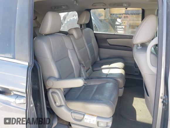 2012 Honda Odyssey EX-L with VIN 5FNRL5H69CB128585, listed as a IAAI auction lot 41695109 with 231,565 mi miles and . Bid and sale history available at carsss.com. Image 8.