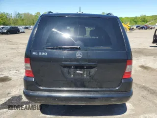 2001 Mercedes-Benz M-Class with VIN 4JGAB54E61A232157, listed as a Copart auction lot 53482584 with 137,549 mi miles and Salvage Title. Bid and sale history available at carsss.com. Image 6.