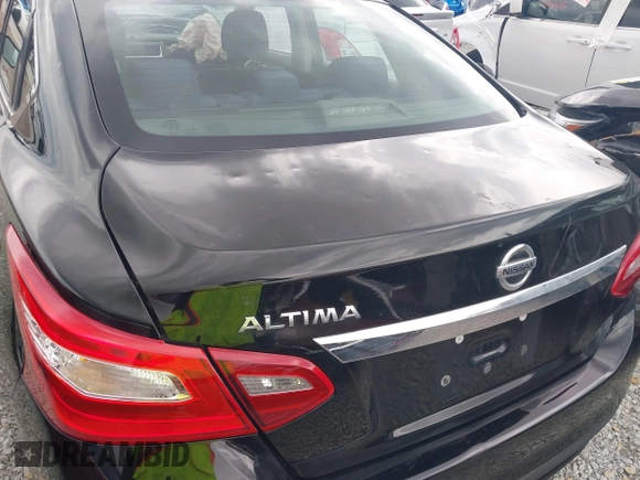 2018 Nissan Altima 2.5 SR with VIN 1N4AL3AP5JC185905, listed as a IAAI auction lot 41899469 with 56,927 mi miles. Bid and sale history available at carsss.com. Image 21.