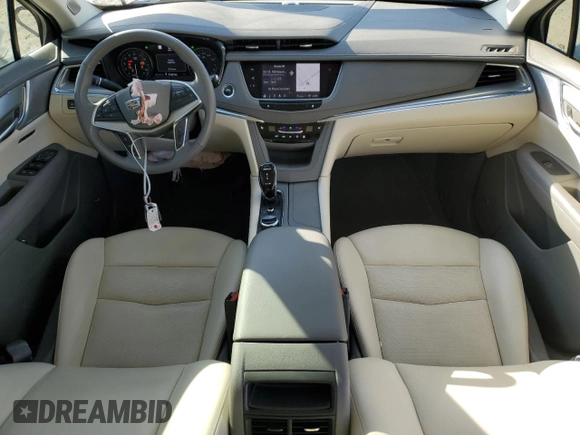2023 Cadillac XT5 FWD Premium Luxury with VIN 1GYKNCRS7PZ150378, listed as a Copart auction lot 84757014 with 21,631 mi miles and Salvage Title. Bid and sale history available at carsss.com. Image 8.