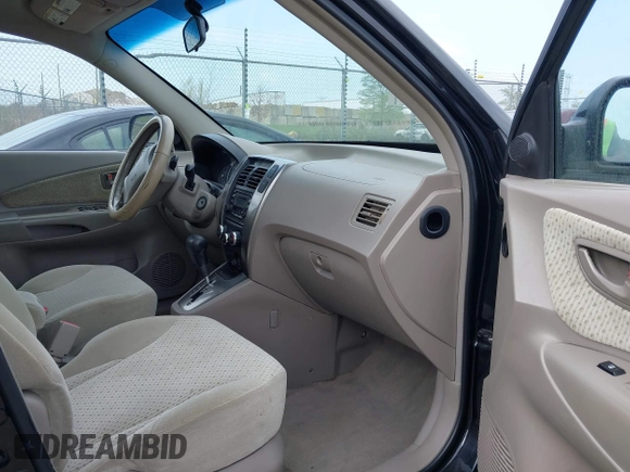 2005 Hyundai Tucson GLS with VIN KM8JN12D55U053476, listed as a IAAI auction lot 42118213 with 202,475 mi miles. Bid and sale history available at carsss.com. Image 5.