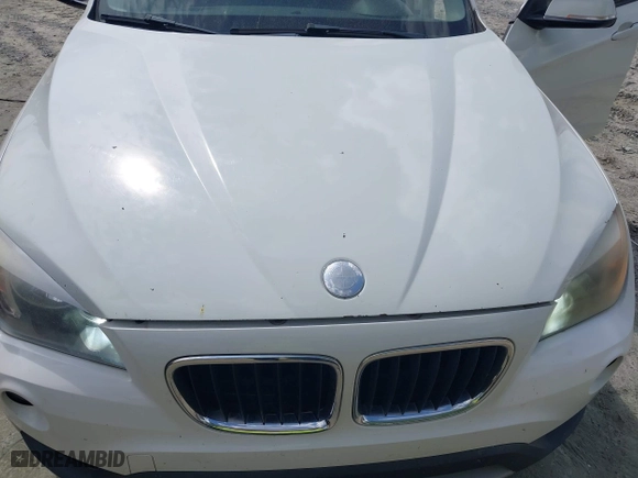 2013 BMW X1 28i with VIN WBAVM1C59DVW44965, listed as a IAAI auction lot 41951047 with 122,191 mi miles. Bid and sale history available at carsss.com. Image 10.