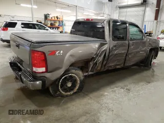 2012 GMC Sierra 1500 SLE with VIN 3GTP2VE73CG227453, listed as a Copart auction lot 52871865 with 133,419 mi miles and Salvage Title. Bid and sale history available at DreamBid. Image 3.
