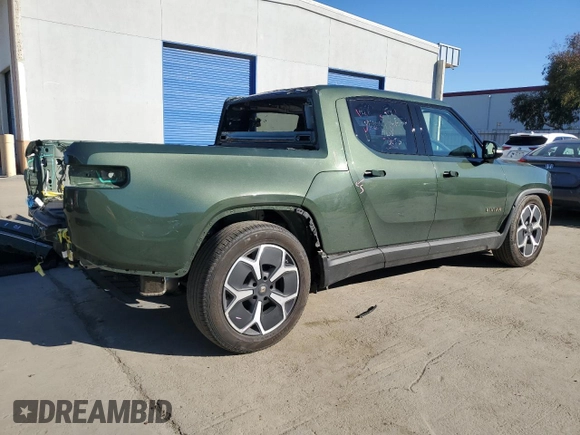 2023 Rivian R1T Adventure with VIN 7FCTGAAA7PN024633, listed as a Copart auction lot 41481365 with 24,965 mi miles and Salvage Title. Bid and sale history available at carsss.com. Image 3.