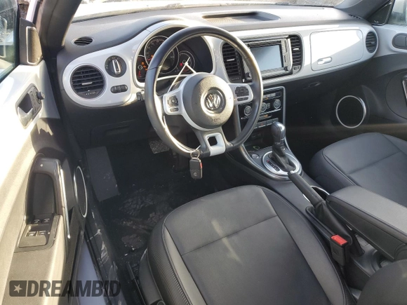 2018 Volkswagen Beetle S with VIN 3VW5DAAT7JM506557, listed as a Copart auction lot 84736194 with 34,930 mi miles and Salvage title. Bid and sale history available at DreamBid. Image 8.