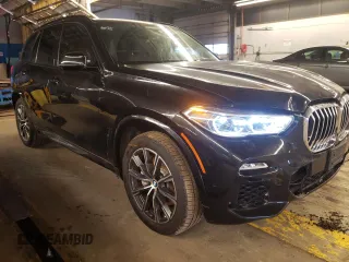 2019 BMW X5 xDrive50i with VIN 5UXJU2C55KLN67350, listed as a Copart auction lot 73114672 with 18,704 mi miles. Bid and sale history available at carsss.com. Image 4.