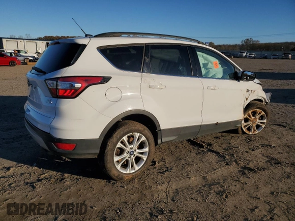 2018 Ford Escape SE z VIN 1FMCU9GD3JUB16376, wystawiony jako Copart lot #83453484 z przebiegiem 163 251 mil mil oraz Szkody całkowita. Historia ofert i sprzedaży dostępna na DreamBid. Obrazek 3.