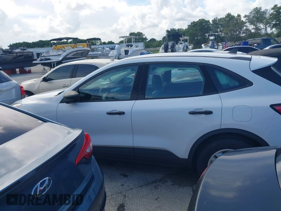 2021 Ford Escape S with VIN 1FMCU0F61MUA36822, listed as a IAAI auction lot 31372199 with 3,842 mi miles and . Bid and sale history available at DreamBid. Image 14.