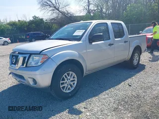2014 Nissan Frontier SV with VIN 1N6AD0ERXEN720686, listed as a IAAI auction lot 42085114 with 275,745 mi miles and . Bid and sale history available at DreamBid. Image 2.