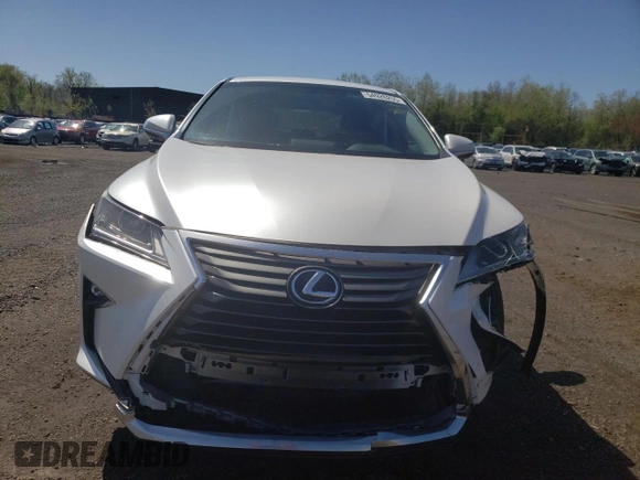 2016 Lexus RX 350 z VIN 2T2BZMCA3GC012763, wystawiony jako Copart lot #54926255 z przebiegiem 58 693 mil mil oraz Szkoda całkowita • Salvage title. Historia ofert i sprzedaży dostępna na DreamBid. Obrazek 5.