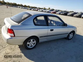 2002 Hyundai Accent с VIN KMHCF35G62U203274, выставлен на аукционе Copart как лот 77047834 с пробегом 90 442 миль миль и Списание • Salvage title. История ставок и продаж доступна на DreamBid. Изображение 3.