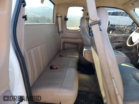 1998 Ford F-150 with VIN 1FTZX18W3WNA25682, listed as a Copart auction lot 47494755 with 197,389 mi miles and Salvage title. Bid and sale history available at DreamBid. Image 10.
