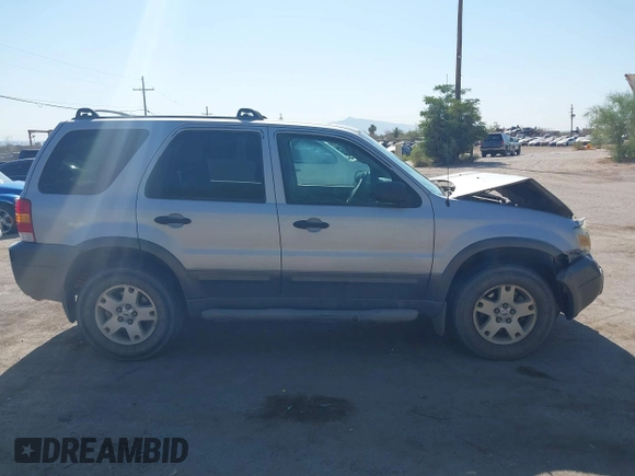 2006 Ford Escape XLT z VIN 1FMCU93136KC15231, wystawiony jako IAAI lot #42625410 z przebiegiem 117 479 mil mil oraz . Historia ofert i sprzedaży dostępna na DreamBid. Obrazek 14.