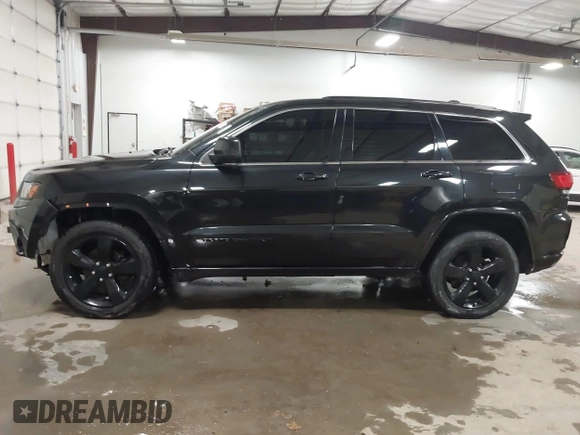 2015 Jeep Grand Cherokee Laredo with VIN 1C4RJFAG3FC115444, listed as a IAAI auction lot 41248211 with 138,828 mi miles. Bid and sale history available at carsss.com. Image 15.
