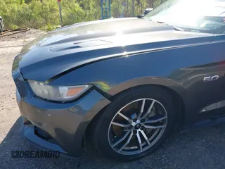 2017 Ford Mustang GT Premium z VIN 1FATP8FFXH5295034, wystawiony jako IAAI lot #41973926 z przebiegiem 153 870 mil mil oraz . Historia ofert i sprzedaży dostępna na DreamBid. Obrazek 18.