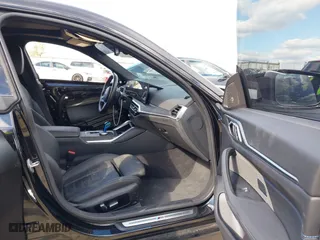 2023 BMW i4 M50 with VIN WBY33AW04PFP30422, listed as a IAAI auction lot 41359006 with 23,199 mi miles. Bid and sale history available at carsss.com. Image 5.
