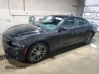 2019 Dodge Charger SXT with VIN 2C3CDXJG1KH757949, listed as a Copart auction lot 82231714 with 75,985 mi miles and Salvage Title. Bid and sale history available at DreamBid. Image 1.