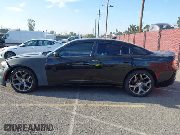 2015 Dodge Charger SXT with VIN 2C3CDXHG9FH915191, listed as a IAAI auction lot 41850427 with 164,535 mi miles and . Bid and sale history available at DreamBid. Image 14.