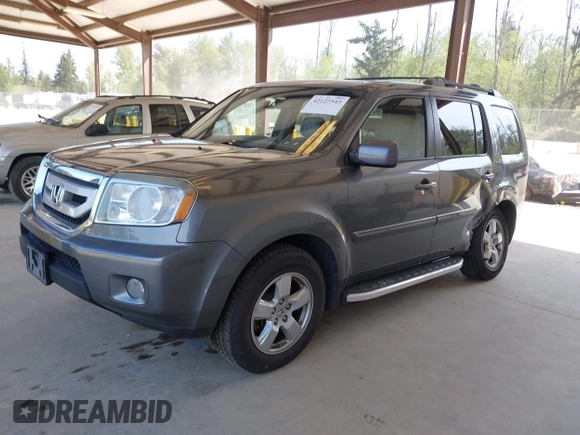 2011 Honda Pilot EX-L with VIN 5FNYF4H56BB503089, listed as a IAAI auction lot 42127543 with 144,227 mi miles. Bid and sale history available at carsss.com. Image 17.