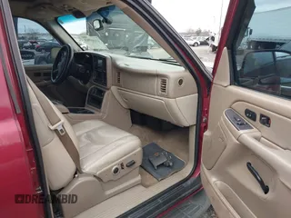 2004 GMC Yukon SLT with VIN 1GKEC13Z54R180532, listed as a IAAI auction lot 41695583 with 231,868 mi miles. Bid and sale history available at carsss.com. Image 5.
