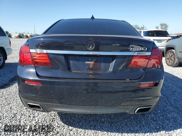 2015 BMW 7 Series 750Li with VIN WBAYE8C51FD781006, listed as a Copart auction lot 48202715 with 50,601 mi miles and Salvage Title. Bid and sale history available at carsss.com. Image 6.