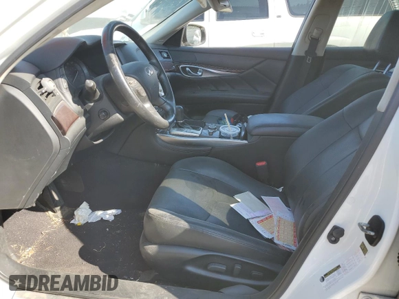 2015 Infiniti Q70 z VIN JN1BY1PP0FM601942, wystawiony jako Copart lot #68659924 z przebiegiem Nie podano mil oraz Szkoda całkowita • Salvage title. Historia ofert i sprzedaży dostępna na DreamBid. Obrazek 7.
