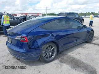 2022 Tesla Model 3 with VIN 5YJ3E1EA4NF191808, listed as a IAAI auction lot 39564406 with 6,756 mi miles. Bid and sale history available at carsss.com. Image 4.