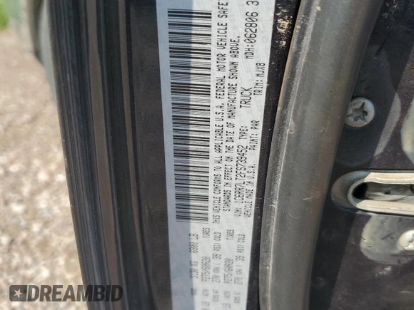 2015 Ram 1500 Outdoorsman with VIN 1C6RR7LT2FS739452, listed as a Copart auction lot 64213285 with 131,959 mi miles and Salvage title. Bid and sale history available at DreamBid. Image 13.
