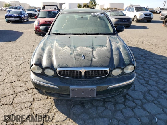 2004 Jaguar X-Type z VIN SAJEB52D94XD67350, wystawiony jako Copart lot #80131904 z przebiegiem 116 329 mil mil oraz Czysty tytuł • Clean title. Historia ofert i sprzedaży dostępna na DreamBid. Obrazek 5.