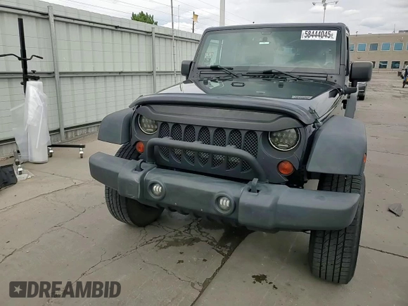 2013 Jeep Wrangler Unlimited Sport with VIN 1C4BJWDG0DL560265, listed as a Copart auction lot 58444045 with 111,354 mi miles and Salvage title. Bid and sale history available at DreamBid. Image 14.