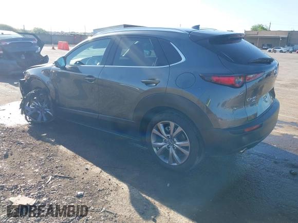 2022 Mazda CX-30 S Premium with VIN 3MVDMBDL0NM413867, listed as a IAAI auction lot 42082560 with 12,375 mi miles and . Bid and sale history available at DreamBid. Image 3.