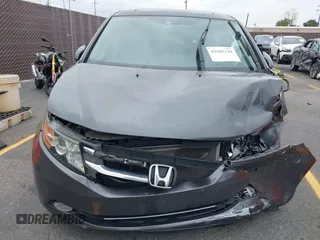 2014 Honda Odyssey Touring with VIN 5FNRL5H97EB114634, listed as a IAAI auction lot 42105220 with Not Provided miles and . Bid and sale history available at carsss.com. Image 11.