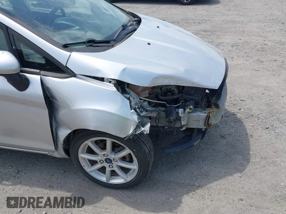 2019 Ford Fiesta SE z VIN 3FADP4EJ9KM107124, wystawiony jako IAAI lot #42067464 z przebiegiem 89 076 mil mil oraz . Historia ofert i sprzedaży dostępna na DreamBid. Obrazek 19.