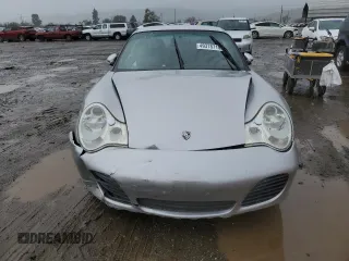 2003 Porsche 911 z VIN WP0AA29983S620988, wystawiony jako Copart lot #49378715 z przebiegiem 99 291 mil mil oraz Szkoda całkowita • Salvage title. Historia ofert i sprzedaży dostępna na DreamBid. Obrazek 5.