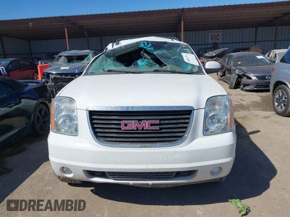 2013 GMC Yukon XL SLT z VIN 1GKS2KE77DR326758, wystawiony jako IAAI lot #41851754 z przebiegiem 144 976 mil mil oraz . Historia ofert i sprzedaży dostępna na DreamBid. Obrazek 12.