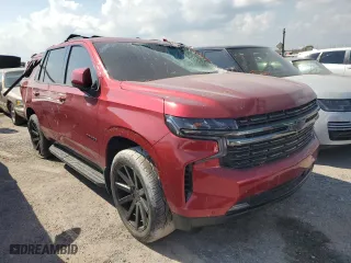 2022 Chevrolet Tahoe RST with VIN 1GNSKRKLXNR128058, listed as a Copart auction lot 76407744 with 0 mi miles and Salvage Title. Bid and sale history available at carsss.com. Image 4.