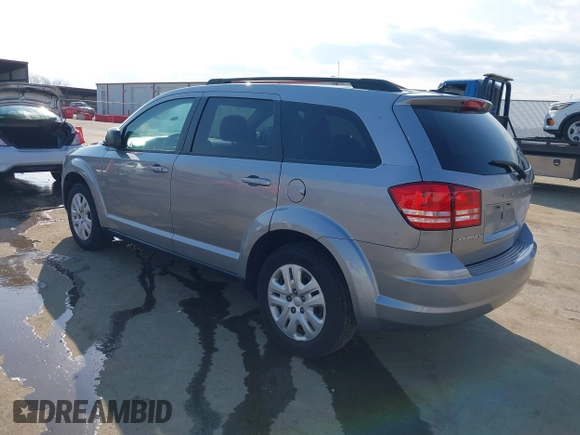 2016 Dodge Journey American Value with VIN 3C4PDCAB3GT234988, listed as a IAAI auction lot 41764190 with 124,077 mi miles and . Bid and sale history available at DreamBid. Image 3.