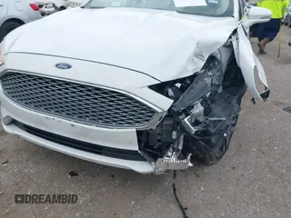 2020 Ford Fusion Titanium с VIN 3FA6P0D98LR151810, выставлен на аукционе IAAI как лот 42590902 с пробегом 76 624 миль миль и . История ставок и продаж доступна на DreamBid. Изображение 6.
