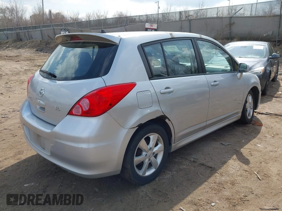 2012 Nissan Versa S with VIN 3N1BC1CP2CK272290, listed as a IAAI auction lot 42030626 with 136,000 mi miles. Bid and sale history available at carsss.com. Image 4.