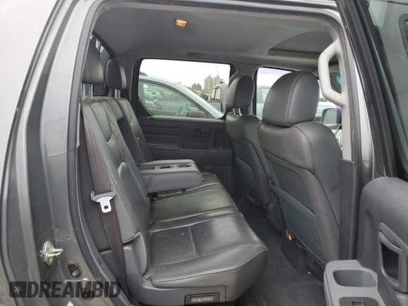 2007 Honda Ridgeline RTL z VIN 2HJYK16577H511325, wystawiony jako Copart lot #57619725 z przebiegiem 161 037 mil mil oraz Szkoda całkowita • Salvage title. Historia ofert i sprzedaży dostępna na DreamBid. Obrazek 10.