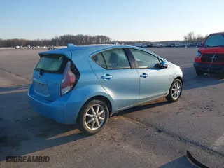 2015 Toyota Prius c One with VIN JTDKDTB37F1086741, listed as a IAAI auction lot 41642663 with 121,313 mi miles. Bid and sale history available at carsss.com. Image 4.