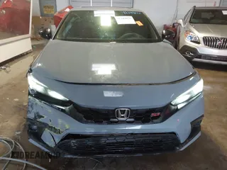 2022 Honda Civic Si with VIN 2HGFE1E59NH472028, listed as a IAAI auction lot 41249075 with 37,970 mi miles and . Bid and sale history available at DreamBid. Image 12.