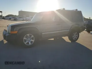 2007 Jeep Commander Limited with VIN 1J8HG58217C591460, listed as a Copart auction lot 44587295 with 246,933 mi miles and Salvage title. Bid and sale history available at DreamBid. Image 1.